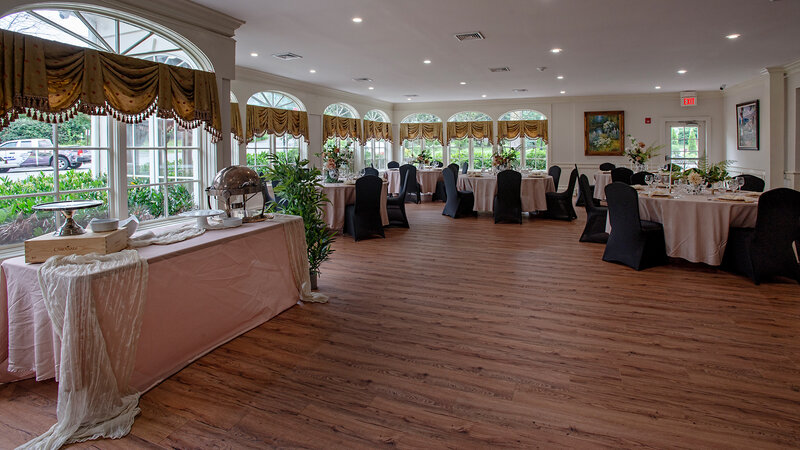 Banquet room with round tables and long table
