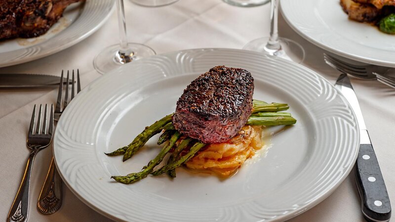Steak entree with asparagus and mashed potatoes