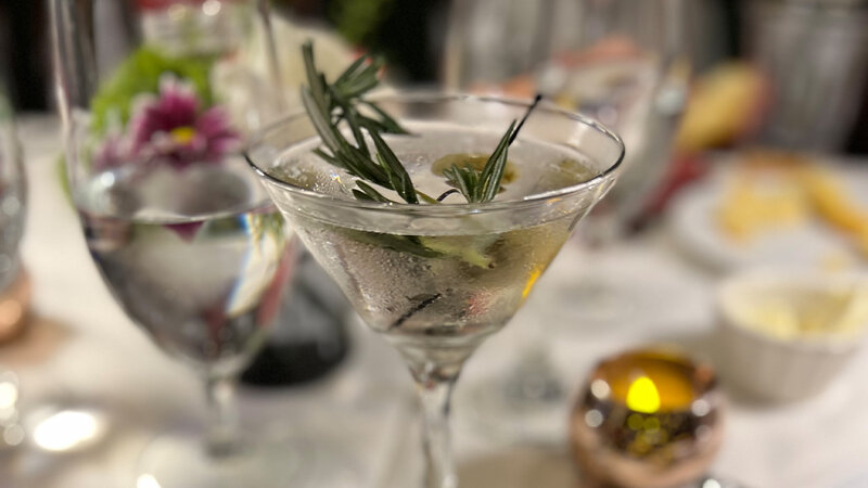 Martini with rosemary garnish