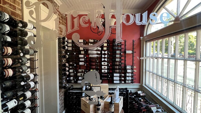 View of wine room with Publck House etched on glass window